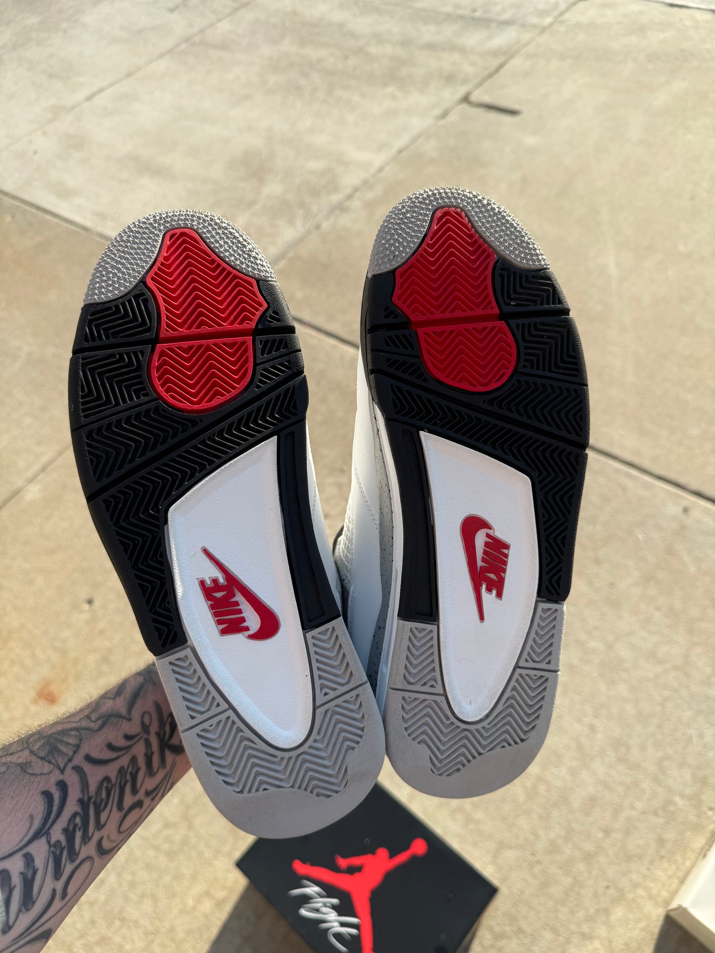 Pre owned Jordan 4 White Cement